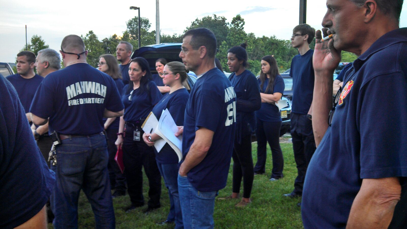 Mahwah Fire Department and EMS members gathered together at dusk before a joint drill
