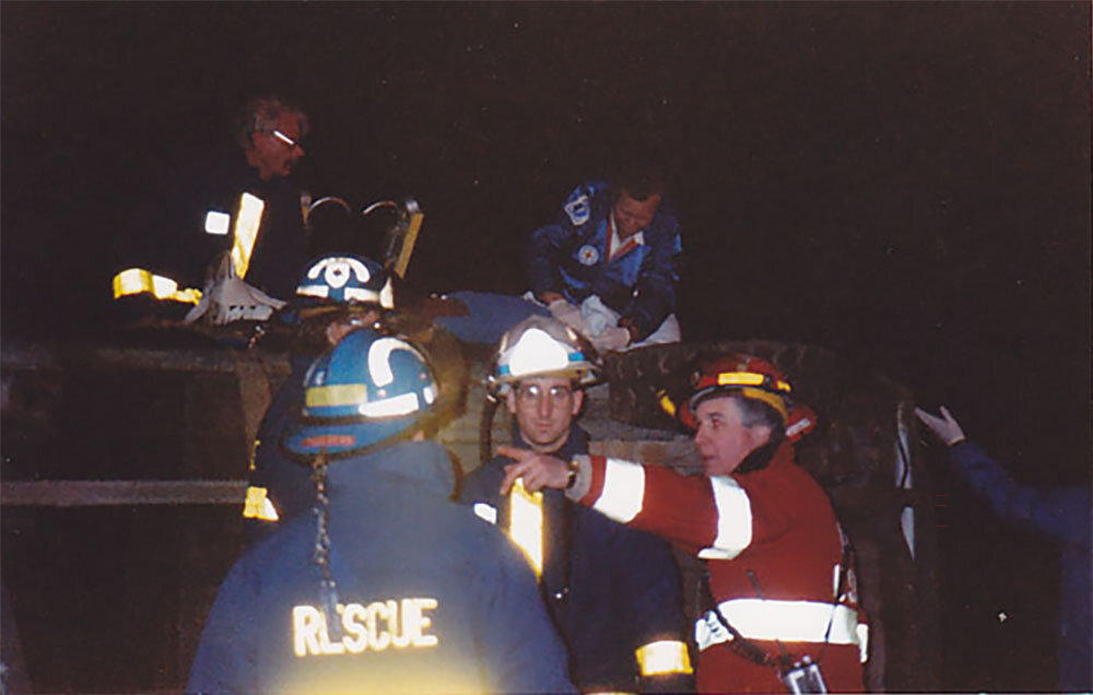 Archival photo of Mahwah first responders working a nighttime extrication